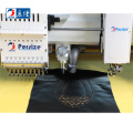 Laser cutting/taping/coiling mixed computerized embroidery machine